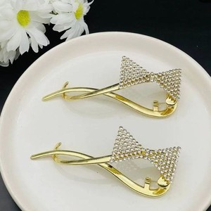 گیره مو زنانه مدل چفتی پاپیون نگینی